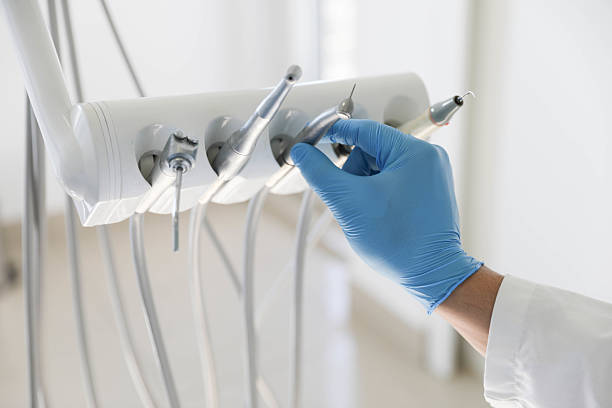 Professional Tooth Extraction technician working in Houston, MO